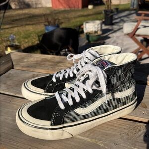 Vans Black and White High-Tops with Striped Pattern